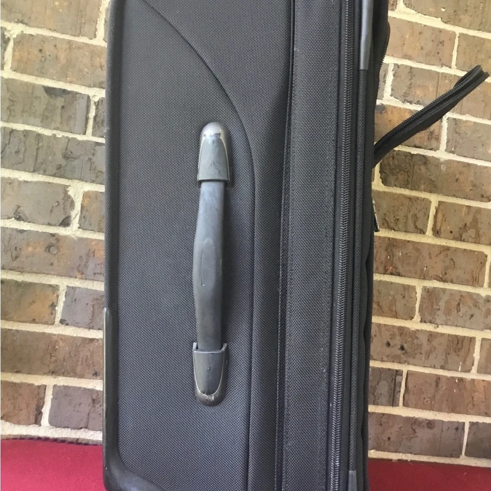 Tumi Black Men's Rolling Carry-On Travel Bag